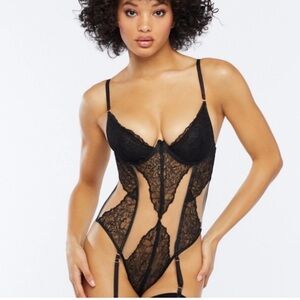 Black Lace Corset Bodysuit with Suspenders 
Savage x Fenty